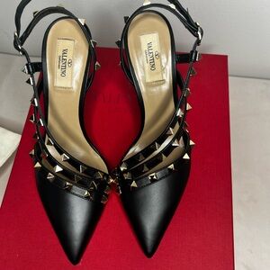 VALENTINO
Black Valentino Garavani Rockstud Slingback Heels
